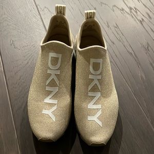 Gold DKNY slip on shoes